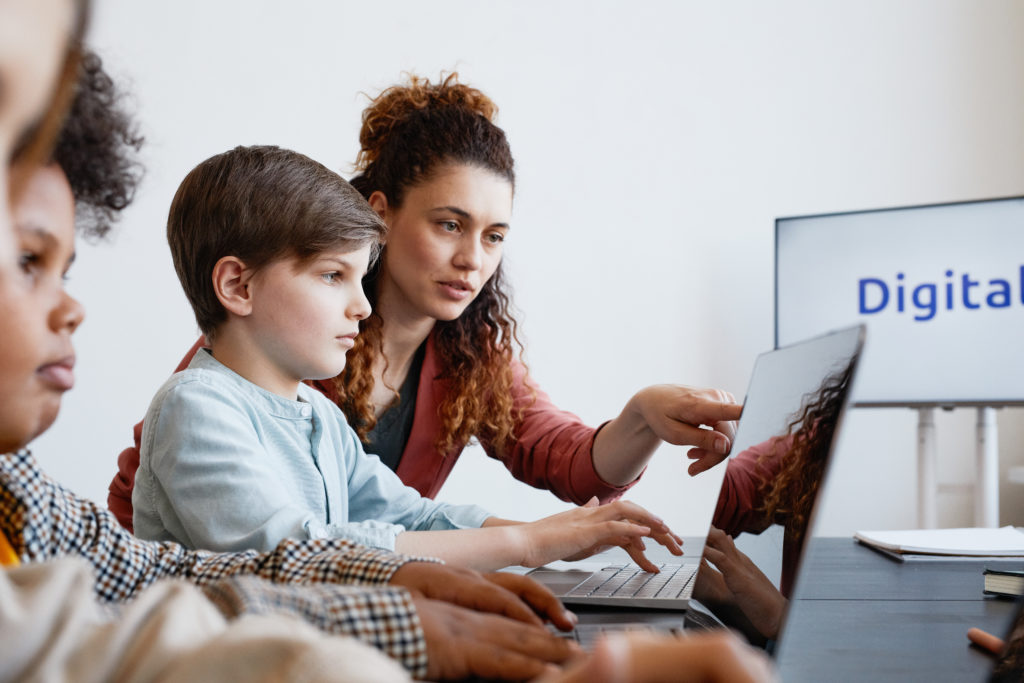 Kids Using Computers in IT Class
