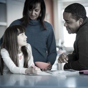 mom-dad-with-tween-daughter