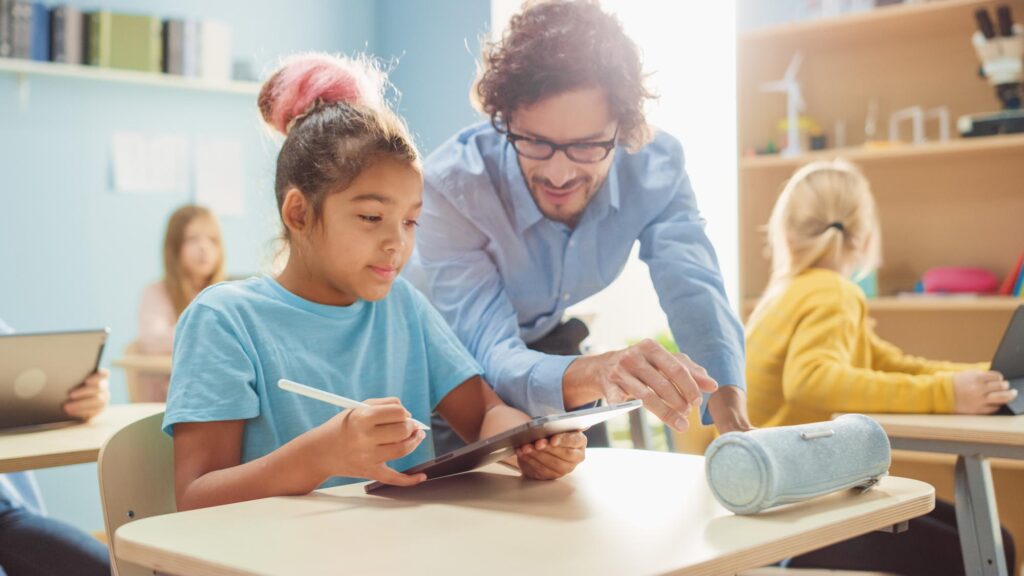 Elementary School Computer Science Class: Cute Girl Uses Digital